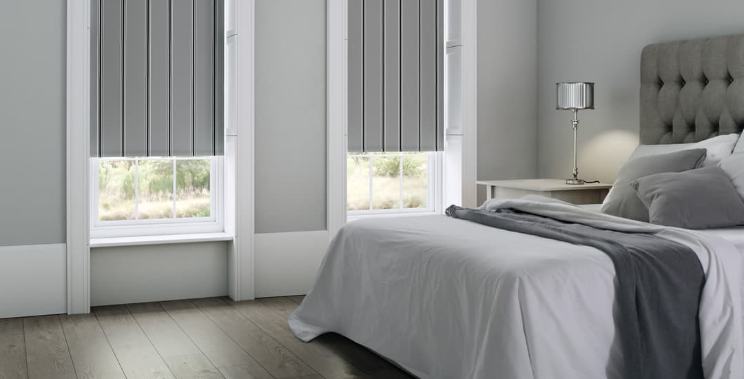Bedroom with roller blinds